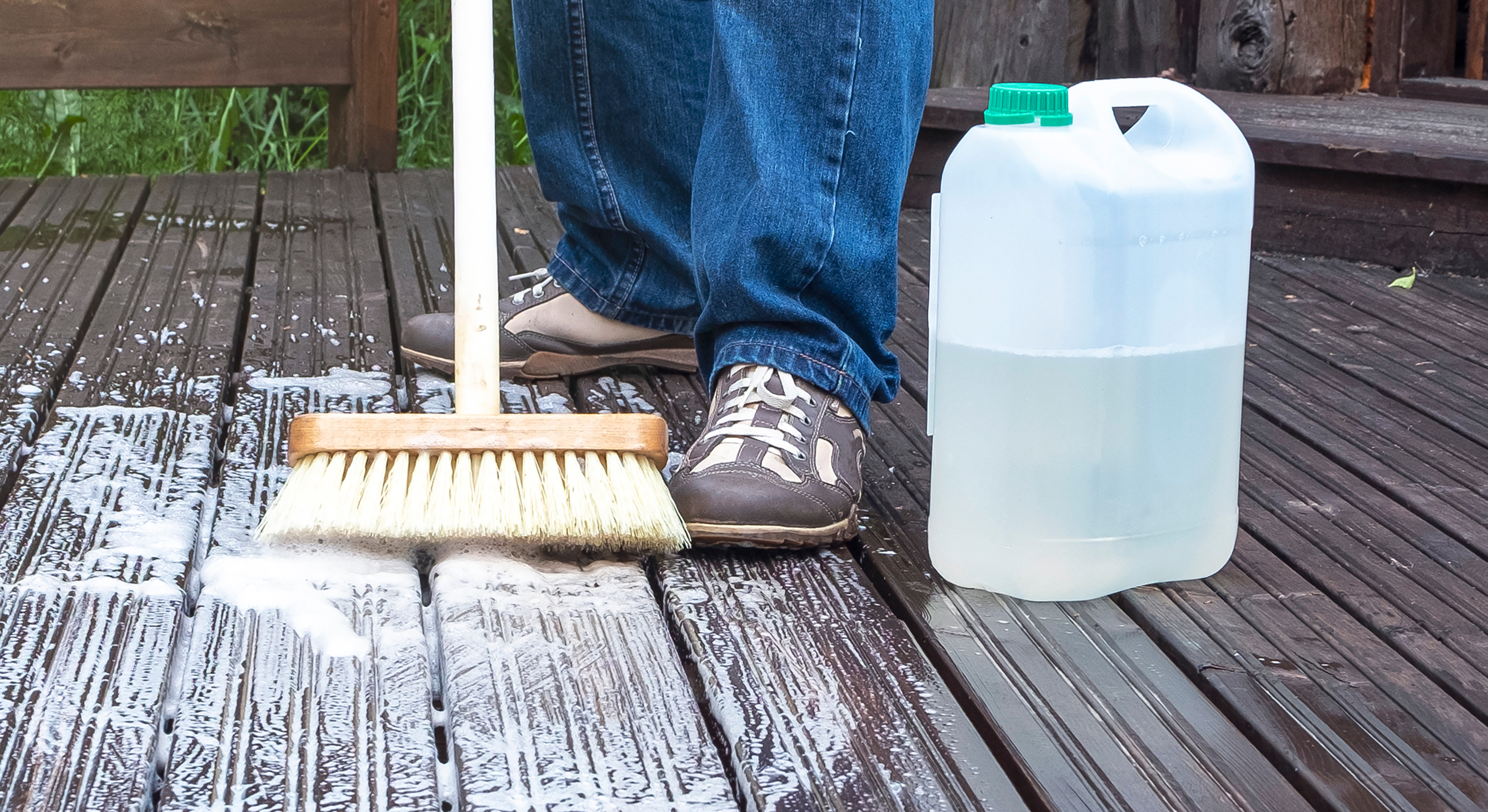 Person scrubbing deck
